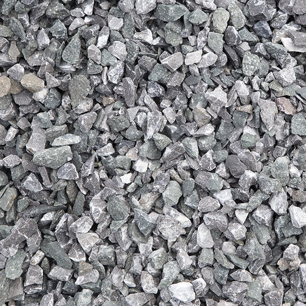 a barrier or edging is recommended to keep walkway gravel in place and prevent it from spreading